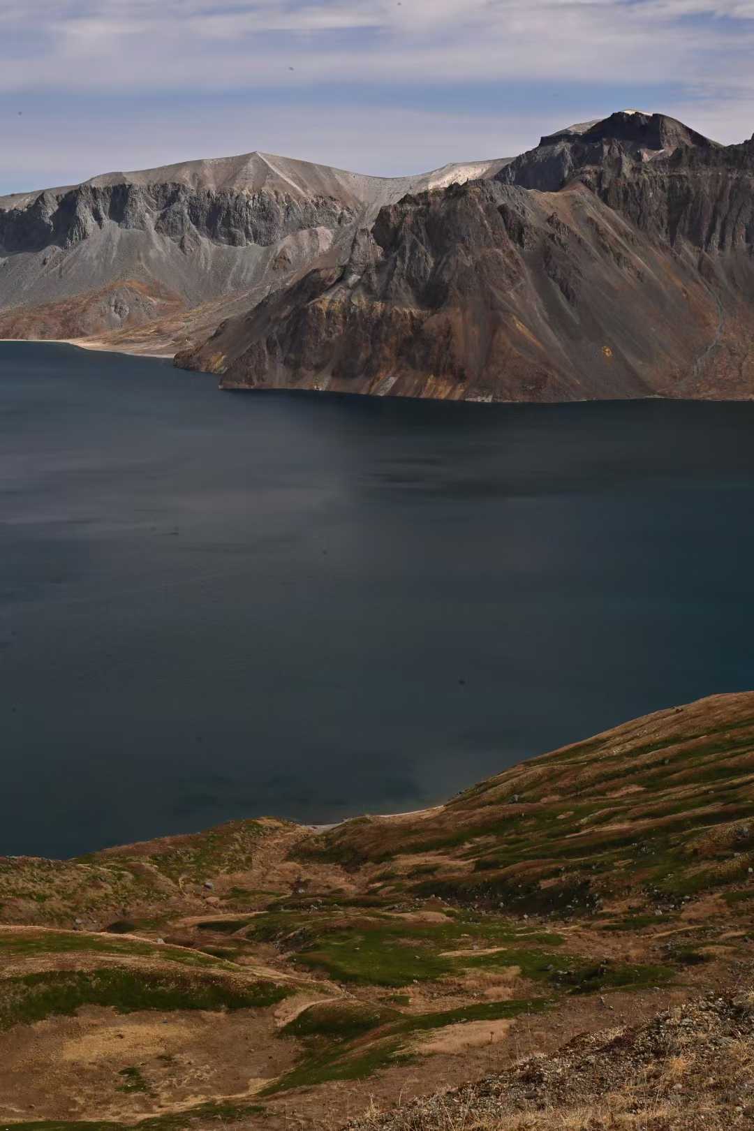 A final vertical study of the crater lake and distant ridges